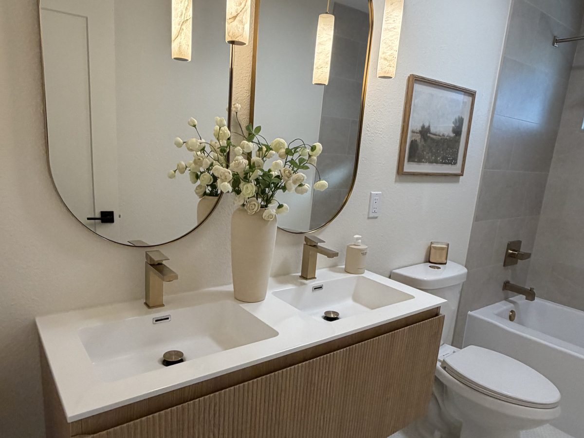 Bathroom remodel with a floating fluted double vanity